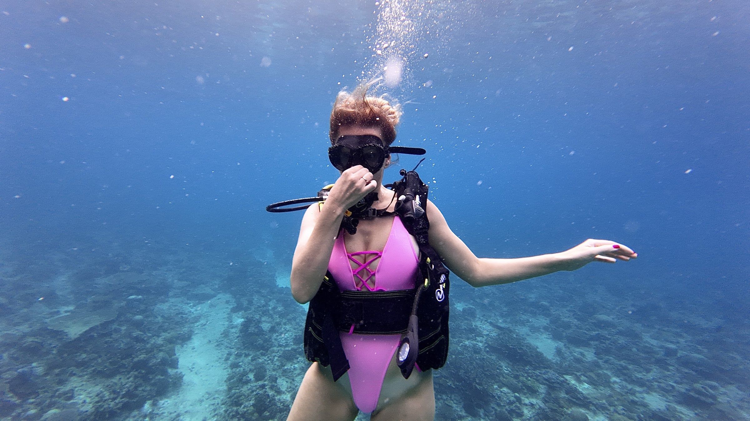 First-time diver smiling underwater